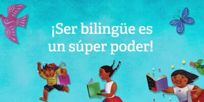 children reading books and a caption that says "Being bilingual is a superpower" in Spanish