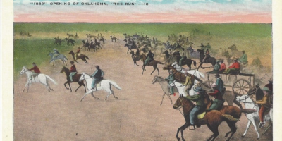 People on horseback riding across the border of Oklahoma for a land run