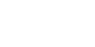 A young woman holding a sign that reads "Immigration: It's the American Way"